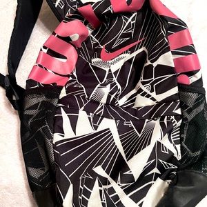 Black and pink Nike backpack. Like new. School backpack.